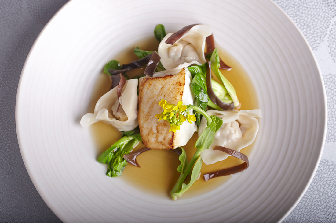 Pan-Seared Alaskan Halibut with Chicken and Dungeness Crab Dumplings